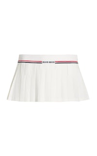 a white pleated skirt with a red, white and blue stripe